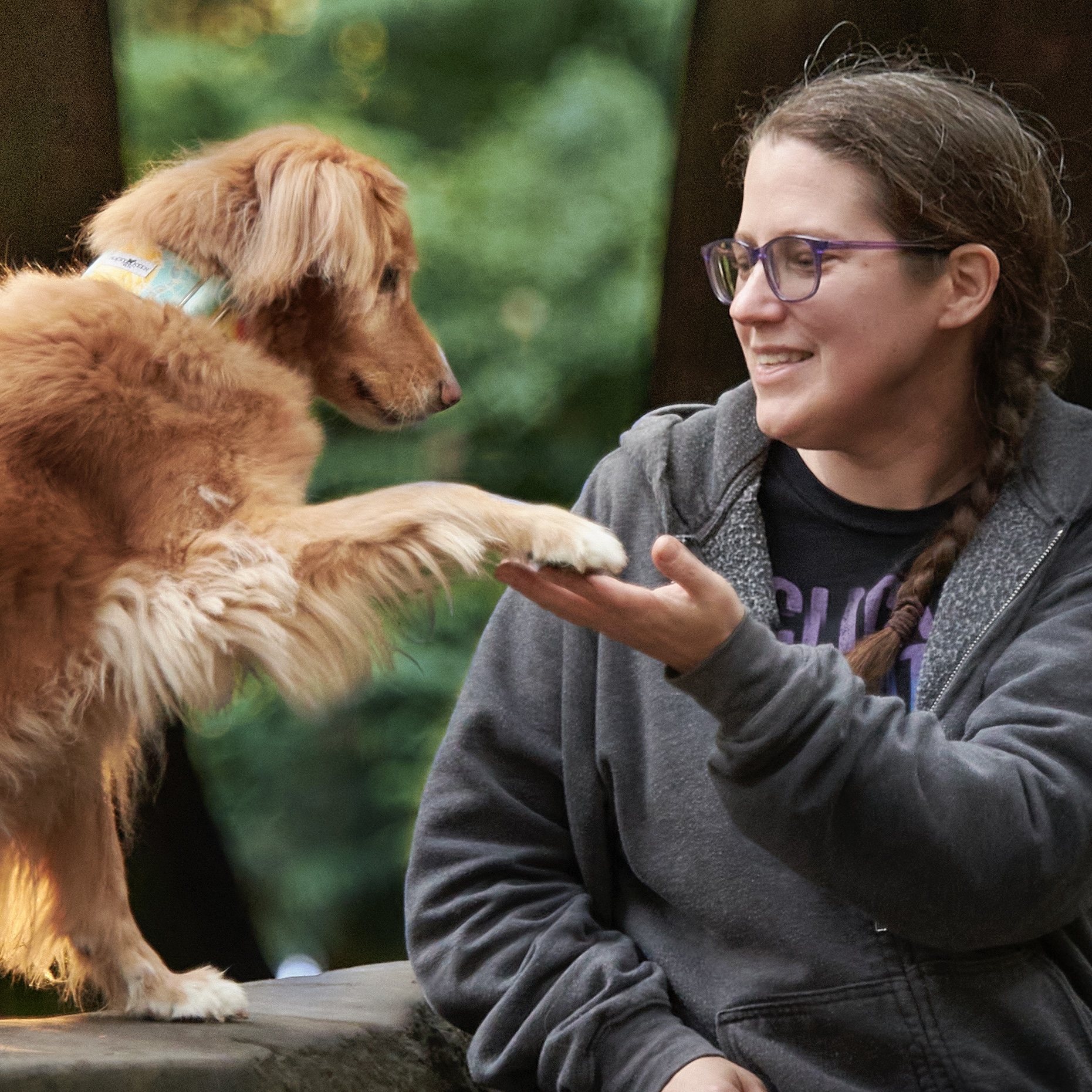 Penny giving Maria her paw.